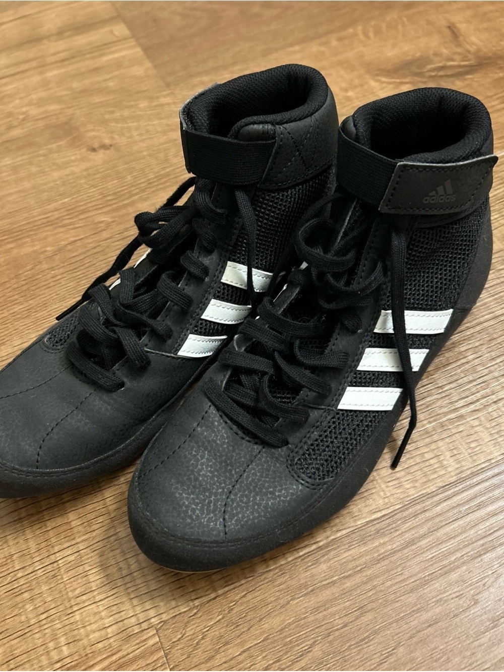 Adidas Men’s Youth Black High-Top Athletic Shoes with White Stripes